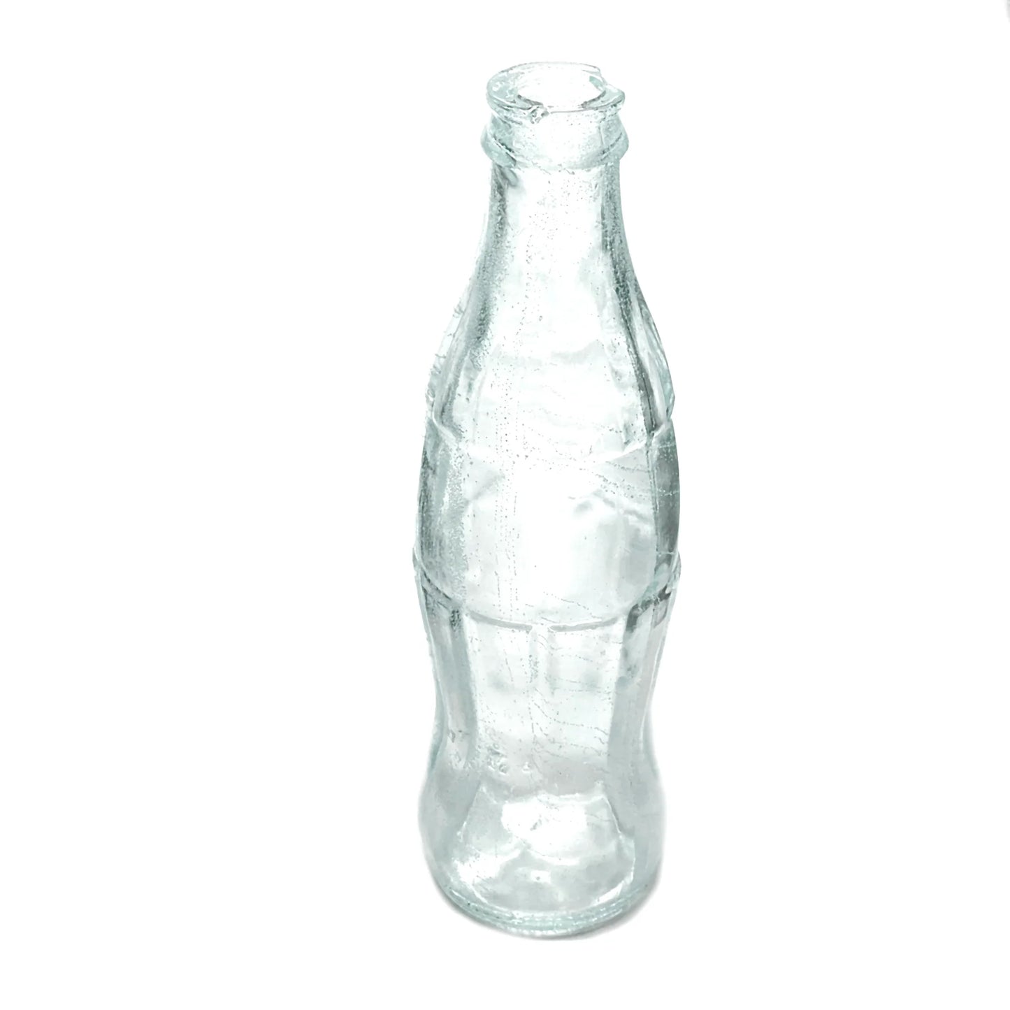 ,,PropBreak" Coca-Cola dūžtantis butelis